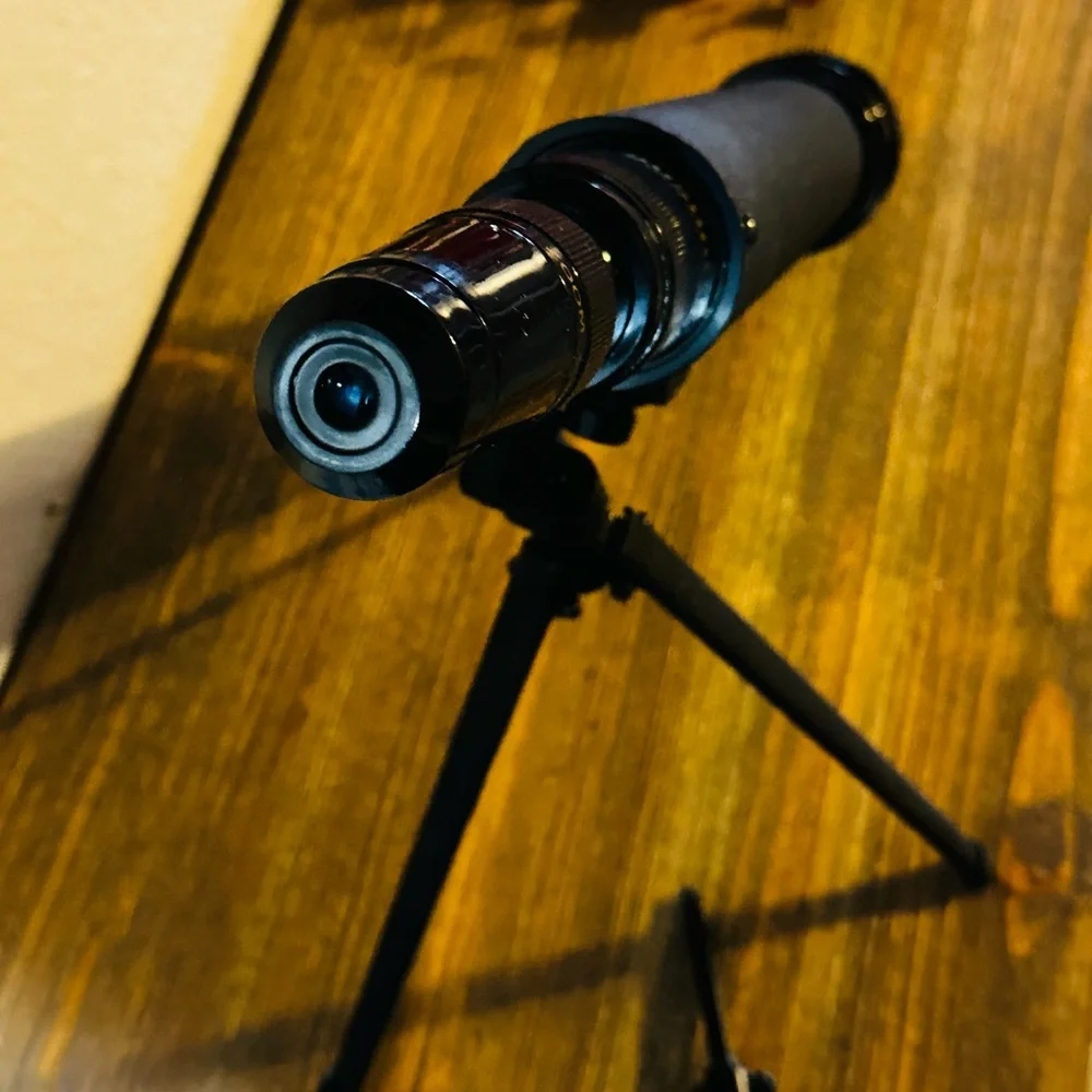 Black Telescope with Tripod